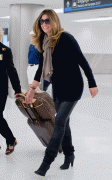 d7af8d58201610 Daisy Fuentes at Miami International Airport on 11/30/09 
